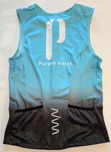 Load image into Gallery viewer, Light blue and black sleeveless athletic top with &#39;Purple Patch&#39; branding on a beige background